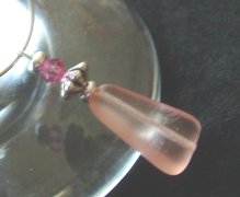 Pink glass triangle wine charm
